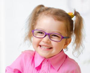 girl wearing colour blind glasses